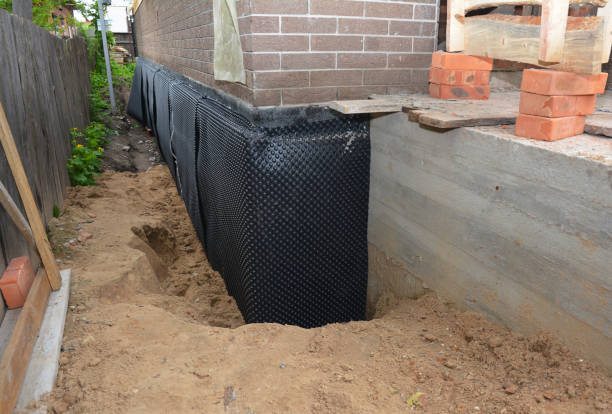 SJ Waterproofing Pros technician performing targeted Sump Pump Installation assessment in Franklin, KY